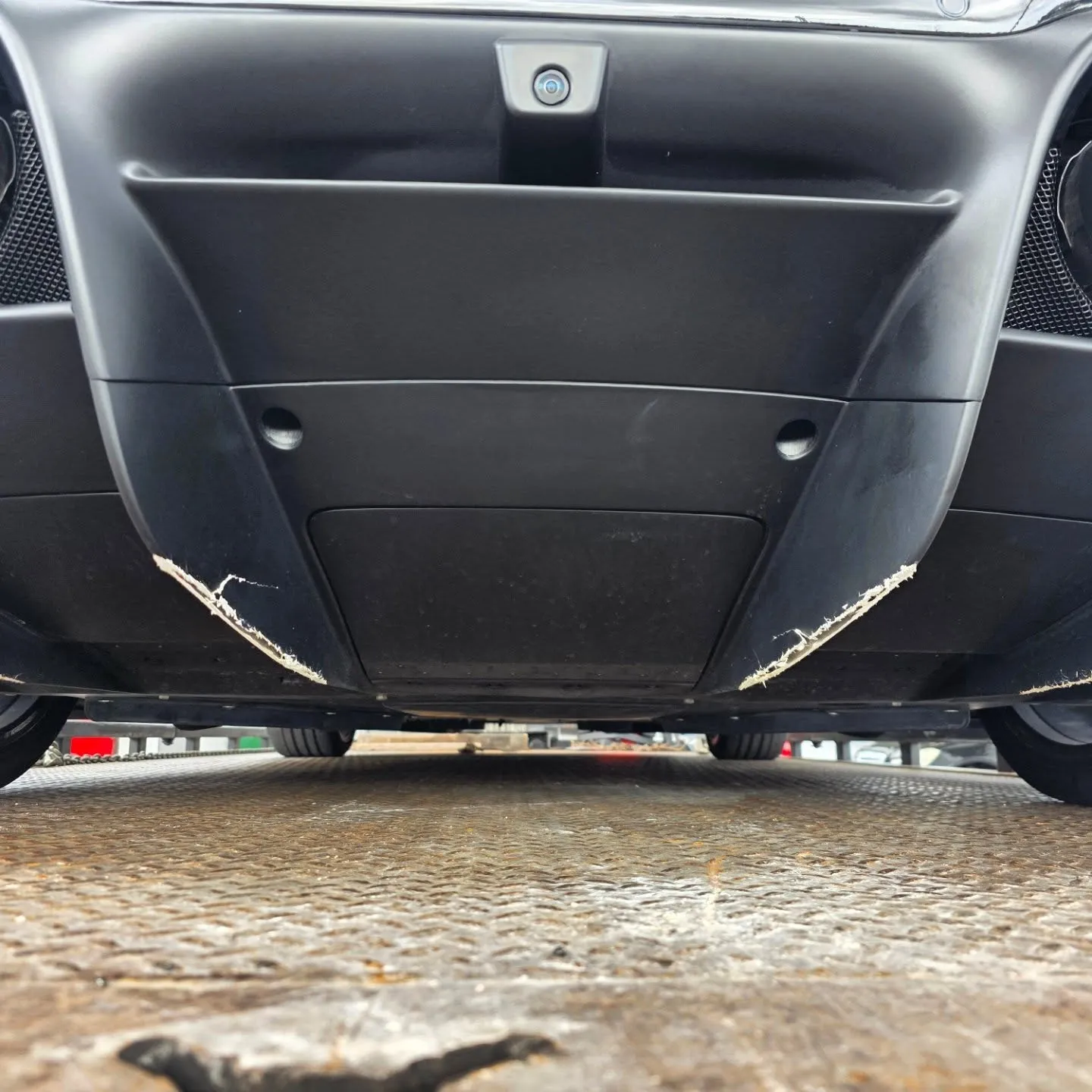 Ferrari with damage before repair at Marlin Motors in Cutler Bay, FL