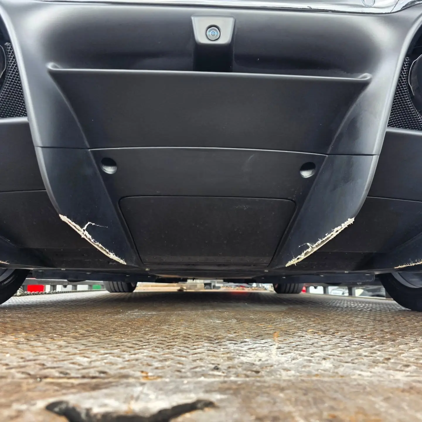 Ferrari with damage before repair at Marlin Motors in Cutler Bay, FL